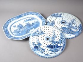 A Chinese export blue and white circular dish drainer with landscape decoration, 13" dia, a