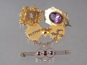 A 9ct gold, amethyst and seed pearl bar brooch, a yellow metal Mizpah brooch, a Victorian yellow