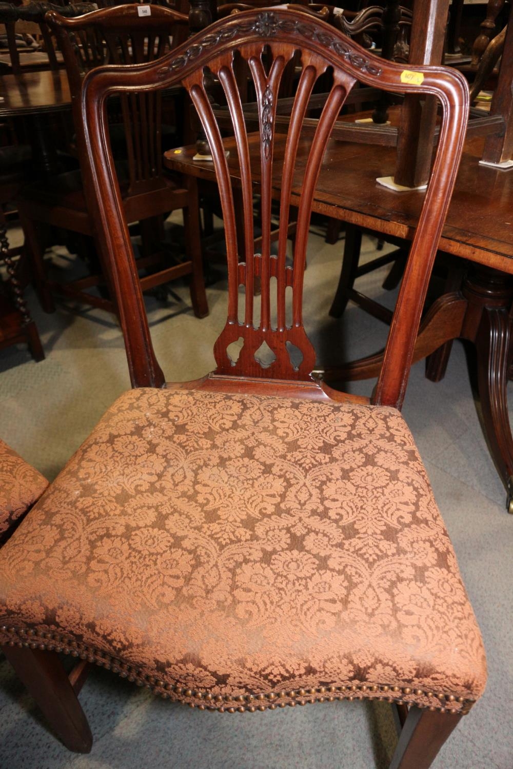 A pair of Georgian mahogany hump back dining chairs of Hepplewhite design with serpentine stuffed - Image 2 of 2