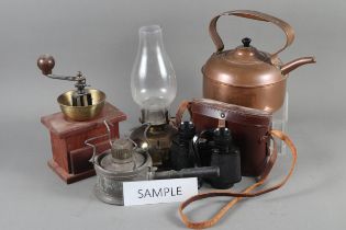 A 19th century brass warming pan, a copper kettle, a coffee grinder, a pair of binoculars and