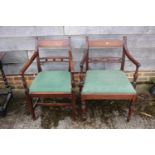 Two 19th century mahogany bar back carver dining chairs with drop-in seats, on turned and