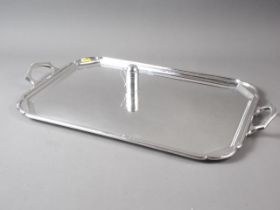 An Art Deco silver plated two-handled tea tray, by Roberts & Belk, 22 1/2" wide, and a silver