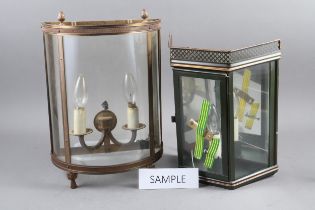A pair of green and gilt metal framed glass fronted wall lights, 12 1/4" high, and another pair of