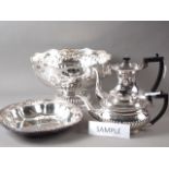 A silver plated punch bowl, a pair of plated trays, a ham stand and other plate