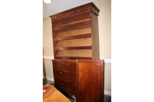 An early 19th century mahogany linen press, the upper section enclosed two panelled doors, fitted - Image 1 of 3