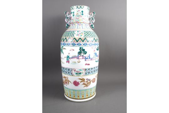 A Chinese famille verte two-handled baluster vase with sectioned figure, fruit and flower - Image 1 of 2