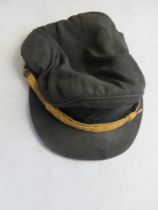 A peaked cap, military or railway interest.