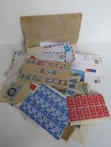 A quantity of 20th century stamps including some part sheets, unused loose stamps,envelopes,