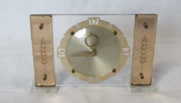 A mid century lucite type mantle clock.