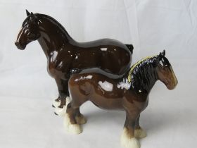 Two Beswick Shire horses.