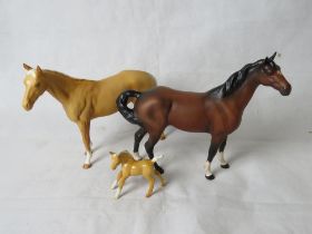 Two Beswick horses and a foal, three items.