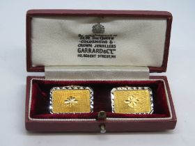 A pair of 18ct gold cufflinks, stamped 750, in associated Garrards box. 9.7g.