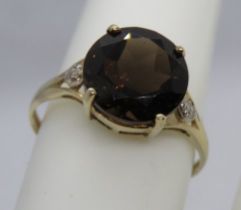 9ct gold smoky quartz and diamond ring, stamped 9k 375, size O.