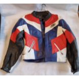 A leather motorcycle jacket by Figo in red white and blue, size 46 chest.