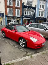 A 2003 Porsche 911 Carrera 4 in Guards Red Brand new engine & upgrades fitted at 25000 miles by