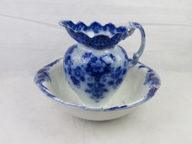 A blue and white wash jug with associated bowl.