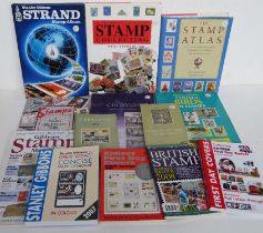 A quantity of stamp and first day cover collectors books.