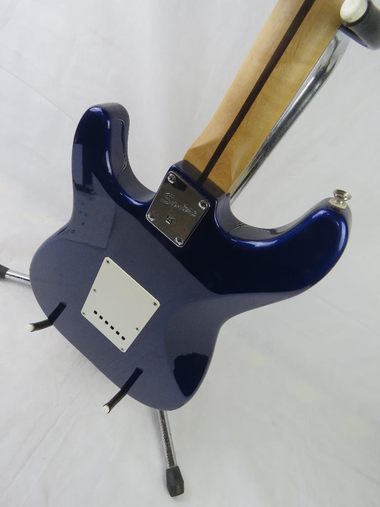 A Fender Squier Stratocaster guitar in dark blue, stand not included. - Image 7 of 8