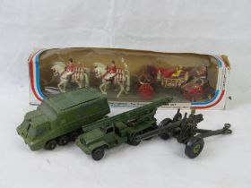 A Dinky Toys Shado 2 together with two other military toys in played with condition,