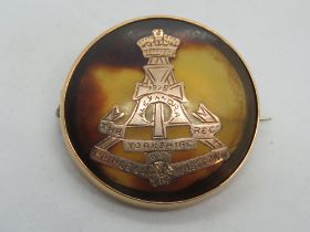 A 9ct gold and tortoiseshell regimental sweetheart brooch for the Yorkshire Regiment,