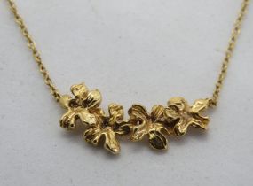 A 9ct gold floral panel necklace, hallmarked 375, 1.9g.