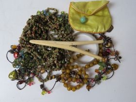 A quantity of assorted costume jewellery inc glass bead boho style necklaces, hard stone necklace,