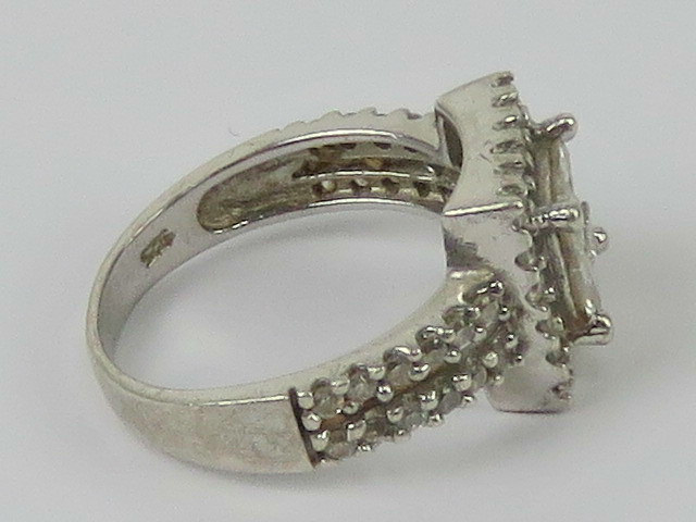 A contemporary silver and cz cluster ring, square shaped with double row band, stamped 925, - Image 2 of 3