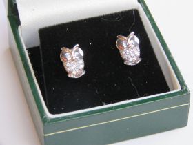 A pair of owl themed stud earrings with butterfly backs stamped 925, in presentation box.