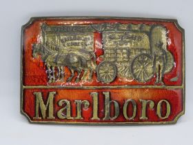 A c1970s Marlboro Cigarettes Wells Fargo Railroad Express belt buckle with red enamel.