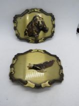 Two c1970s belt buckles by Raintree Buckle & Jewellery Inc, USA, a/f.