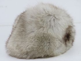 A vintage fur hat, bearing label for National Fur Company.