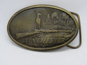 A Winchester gun belt buckle by Indiana Metal Crafts.
