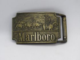 A c1970s Marlboro Cigarettes western belt buckle.