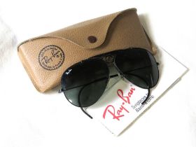 Rayban - a pair of vintage black classic Aviator sunglasses with black lenses and branded case.