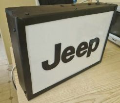 A contemporary illuminated Jeep box sign, 43 x 33 x 9cm.