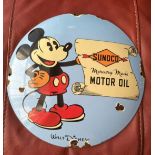 A contemporary 'distressed' enamelled advertising roundel for Sunuco Motor Oil featuring Walt