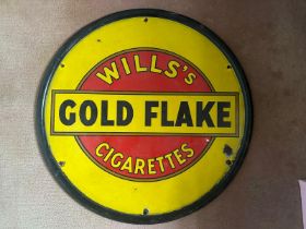A vintage enamelled circular roundel advertising sign for Will's Gold Flake Cigarettes,