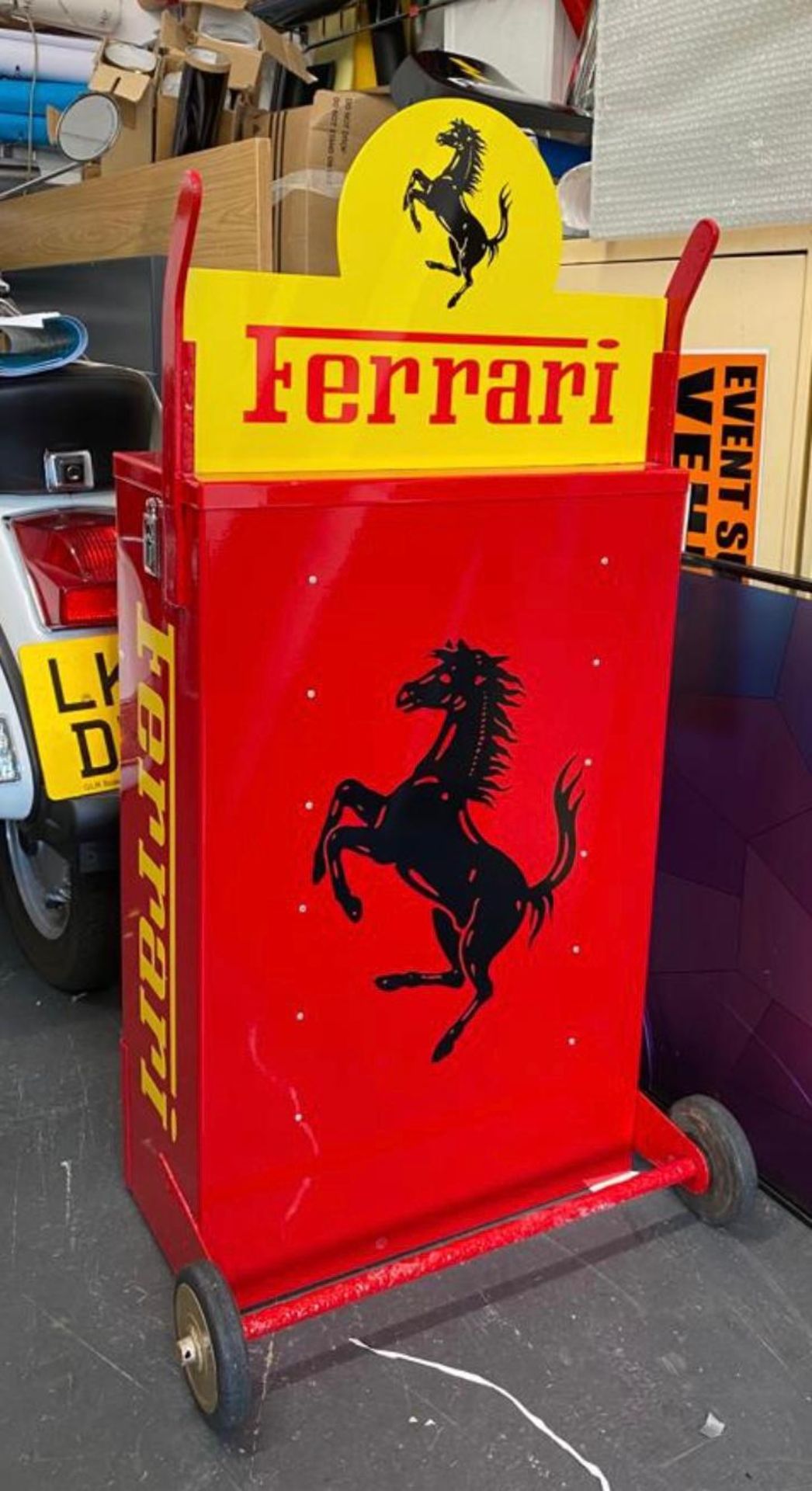 A superb automotive wine rack in Ferrari colours formed from an original Castrol Oil mobile rack. - Image 2 of 7