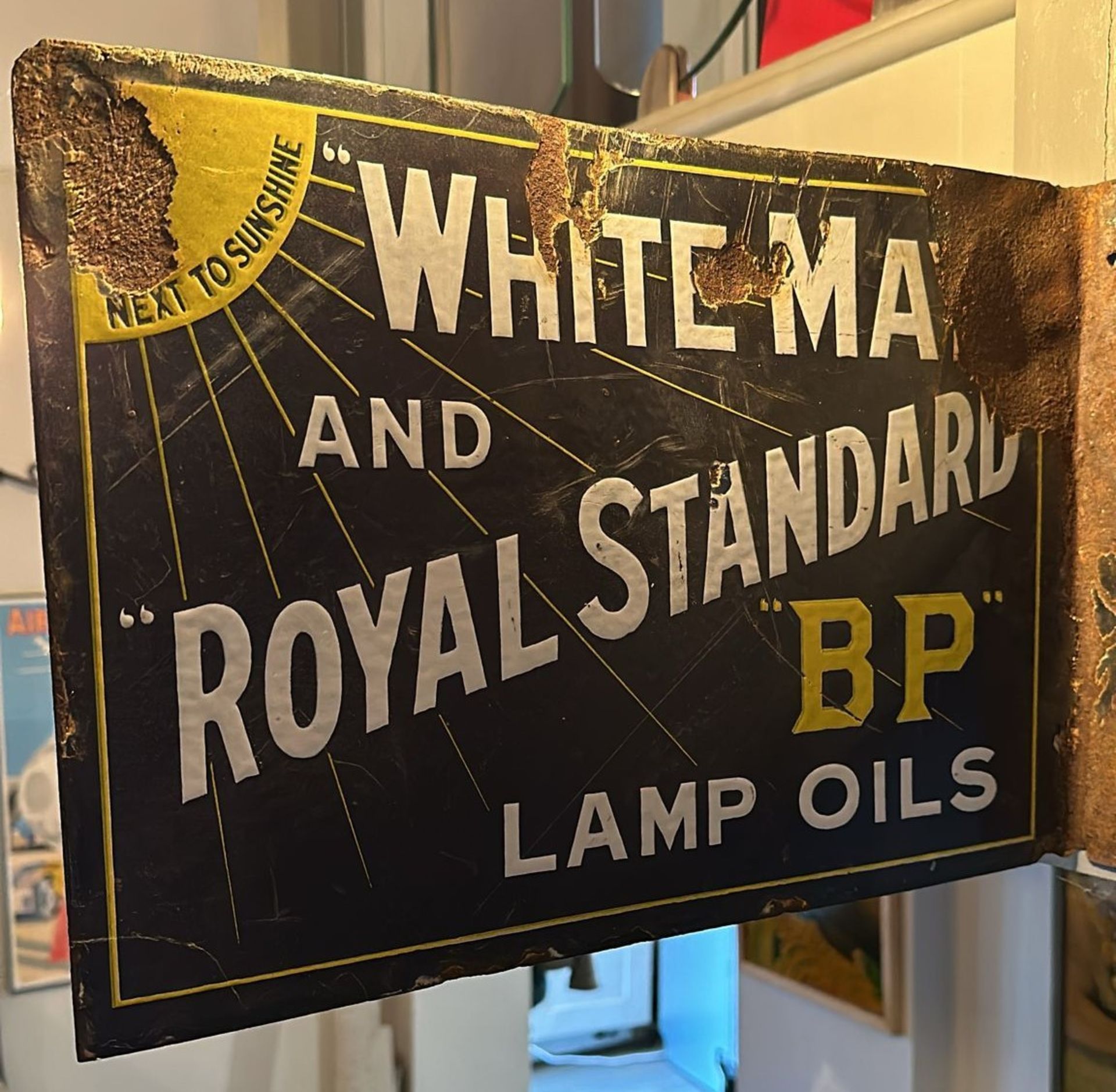 A vintage double-sided enamelled advertising sign for White May and Royal Standard BP OIl Lamps,