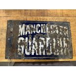A vintage enamelled double sided advertising sign for Manchester Guardian,