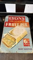 A vintage enamelled advertising sign for Lyons Individual Fruit Pie, approx 58 x 40cm (23 x 16").