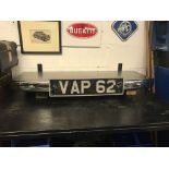 A superb man-cave shelf formed from a vintage chrome bumper and plate.