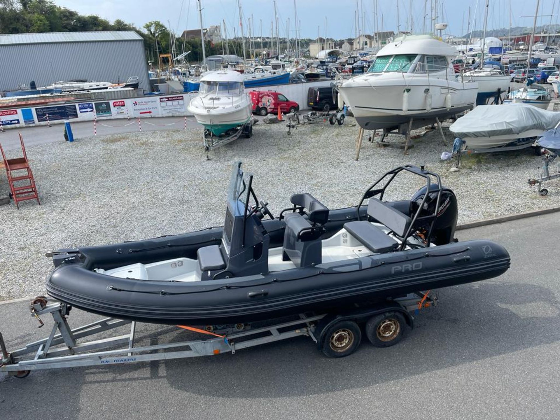 Zodiac 650 Pro rigid inflatable boat with Mercury 150 outboard engine. Includes road trailer. - Image 8 of 14