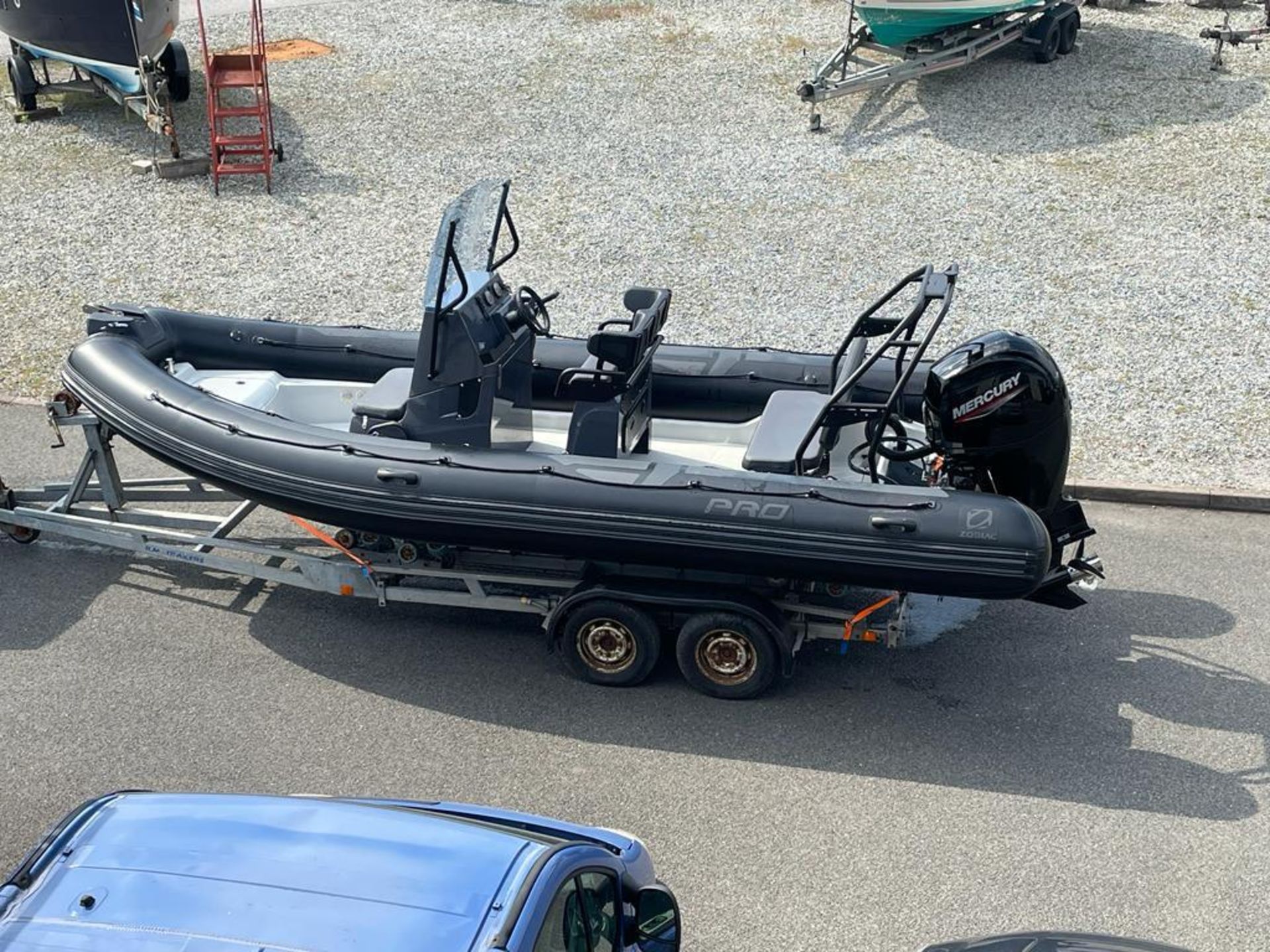 Zodiac 650 Pro rigid inflatable boat with Mercury 150 outboard engine. Includes road trailer. - Image 9 of 14