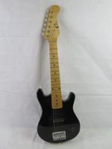 A Cleca small size electric guitar in black.