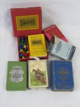 A quantity of vintage playing cards and Sorry board game.