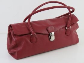 Tommy & Kate; a red leather handbag approx 39cm wide.