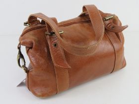 A tan leather handbag approx 30cm wide.