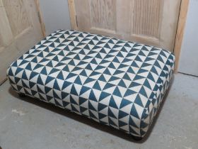 A French Connection DFS large footstool.