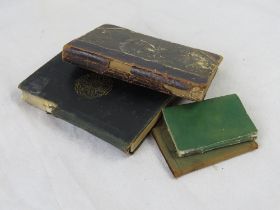 Four vintage books including Uncle Toms Cabin 1852, The Pilgrims Progress,